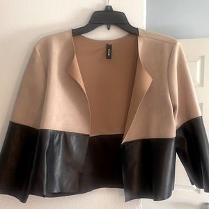 Brown and black blazer have sleeves